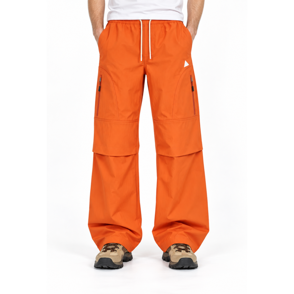 Cheviot men's orange trousers, waist-down studio view