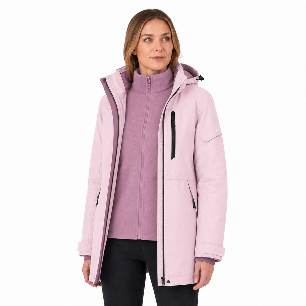 Woman wearing the Blush Pink Derwent jacket open over its colour-matched fleece