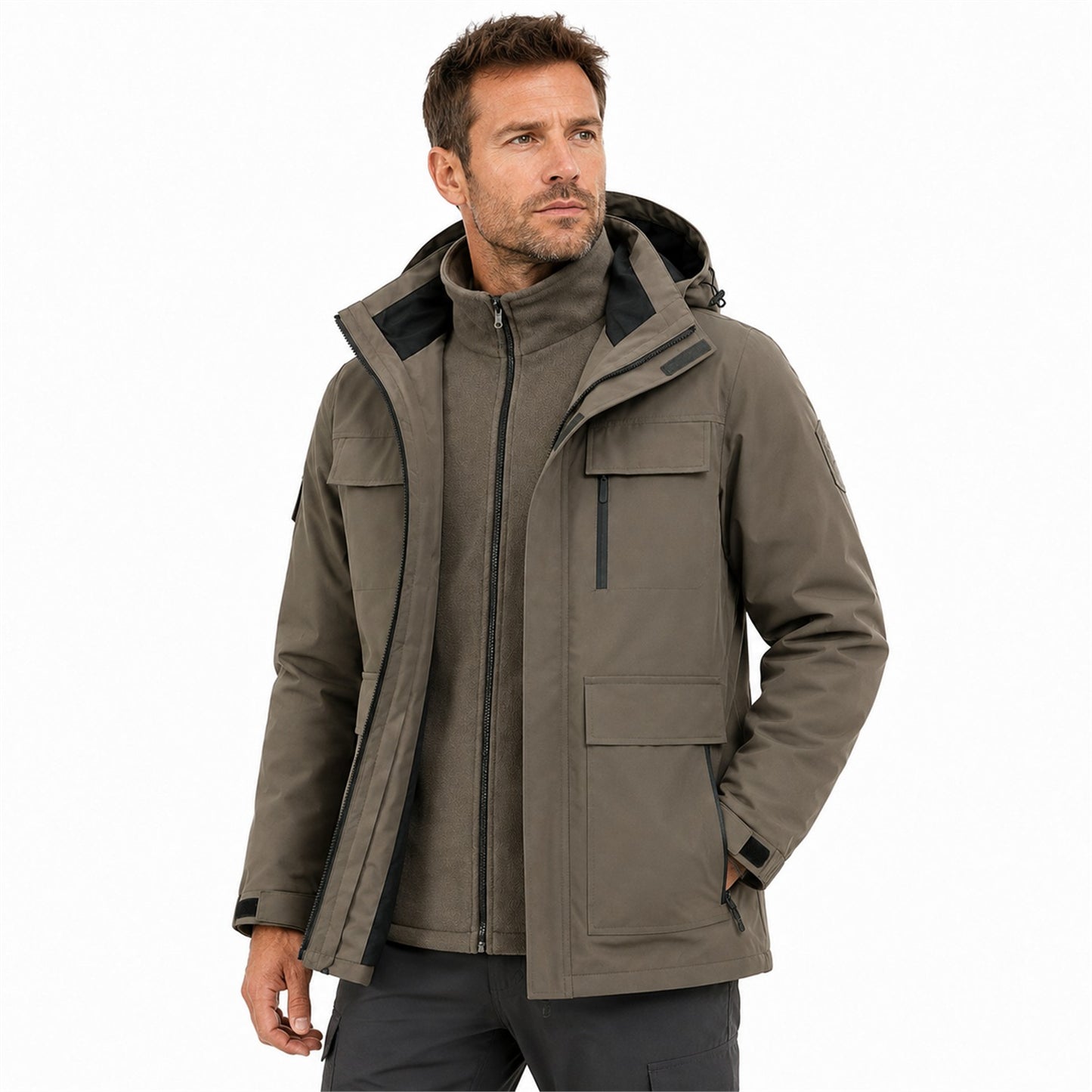 Man wearing the Brown Ribble jacket open over its colour-matched fleece