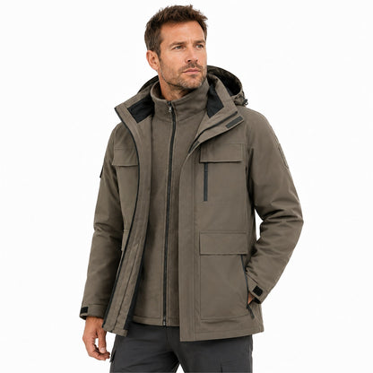 Man wearing the Brown Ribble jacket open over its colour-matched fleece