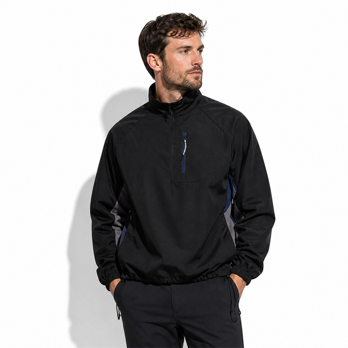 Man wearing black Grizedale smock jacket on white