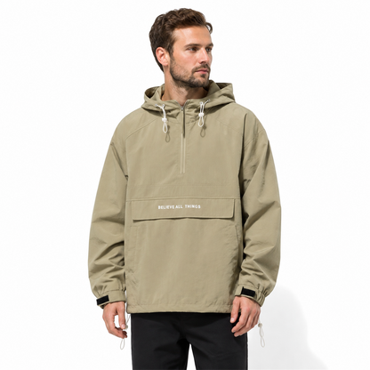 Man wearing Sage Green Haworth smock jacket on white