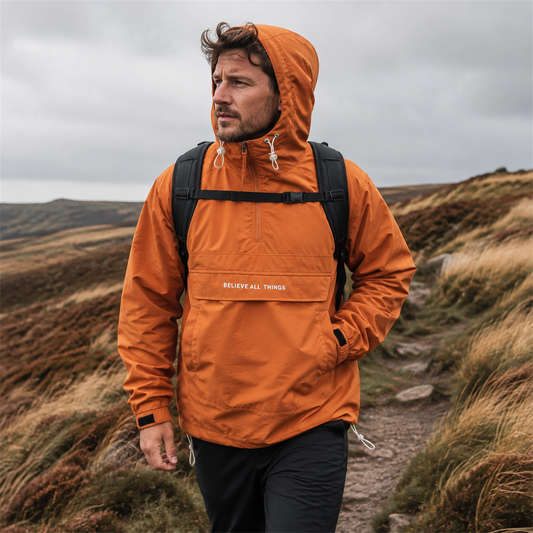 Man wearing Caramel Haworth smock outdoors on a windy British moor