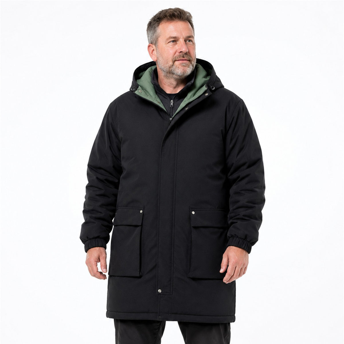 Outdoorsy man wearing the Lowther black longline hooded jacket