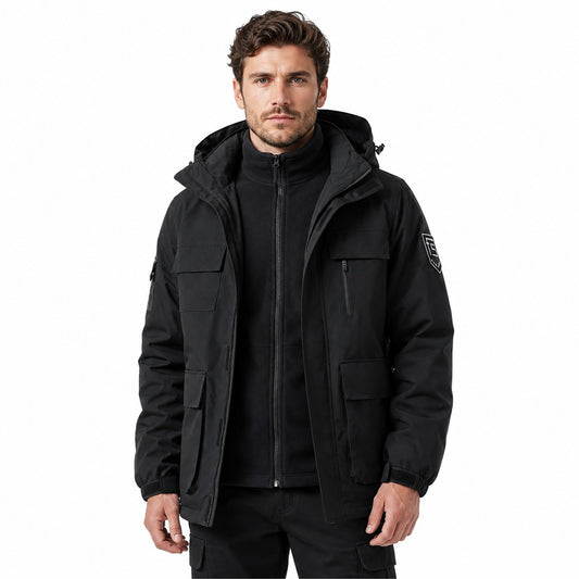 Man wearing black Tamar jacket open over zipped fleece